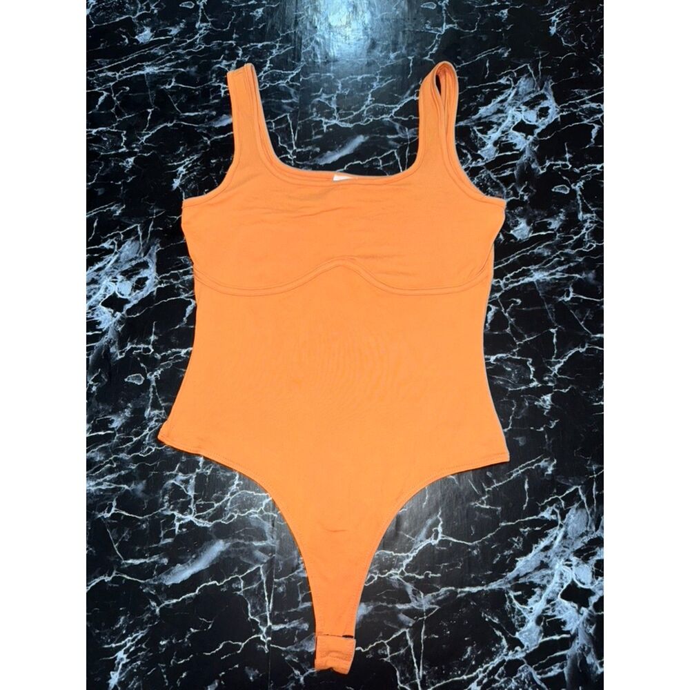 Le Lis Orange bodysuit